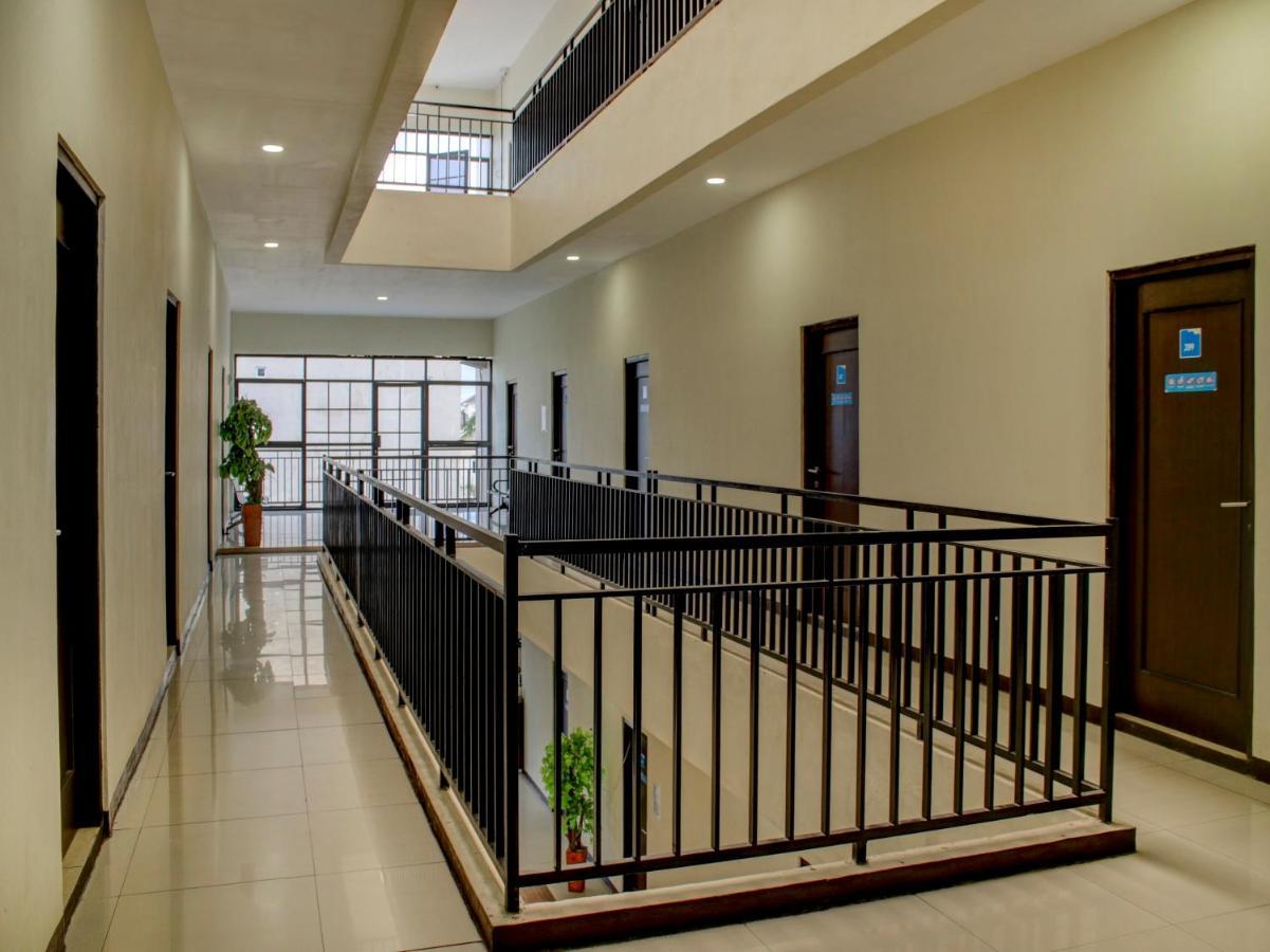 Oyo 90162 Remboelan Guest House Sungai Lutus Exterior photo