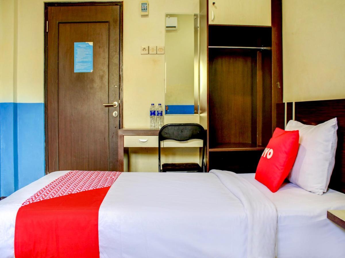Oyo 90162 Remboelan Guest House Sungai Lutus Exterior photo