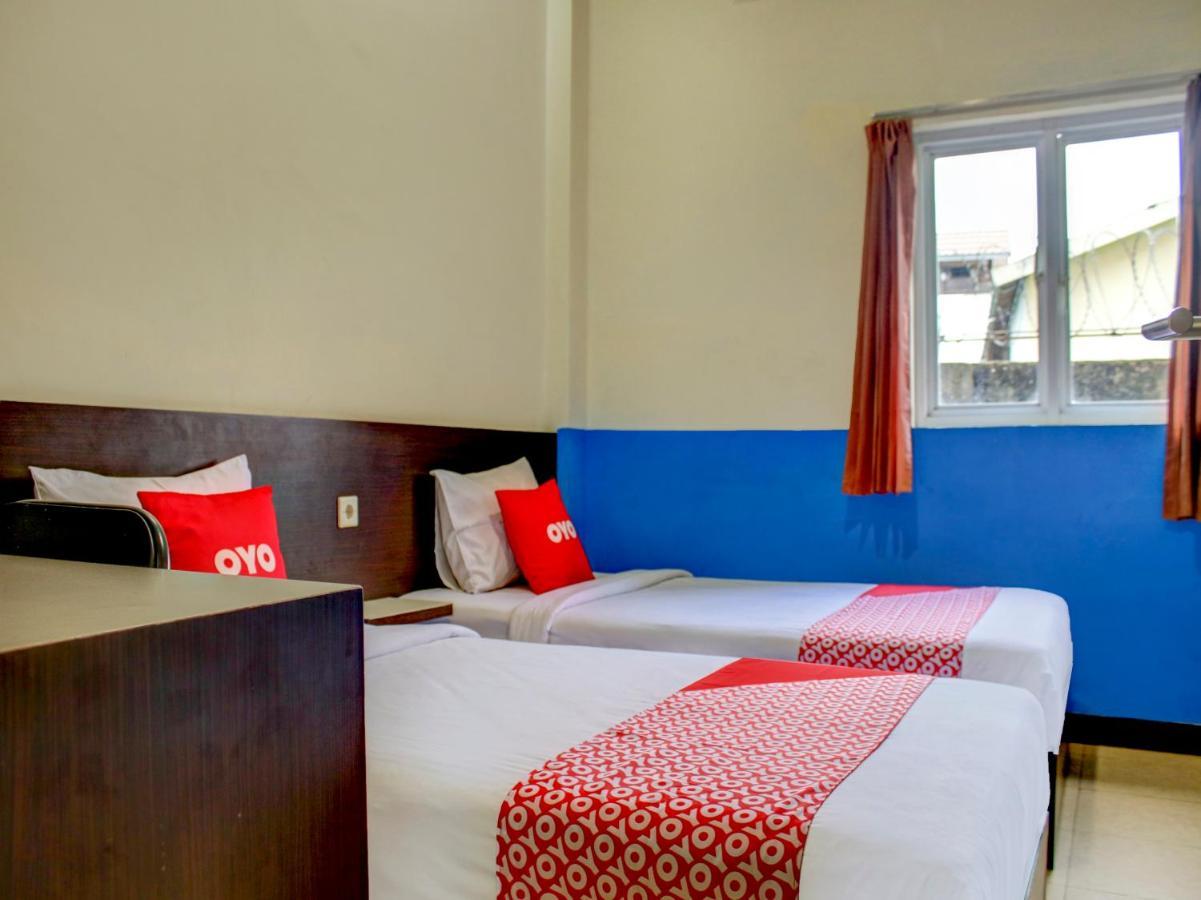 Oyo 90162 Remboelan Guest House Sungai Lutus Exterior photo