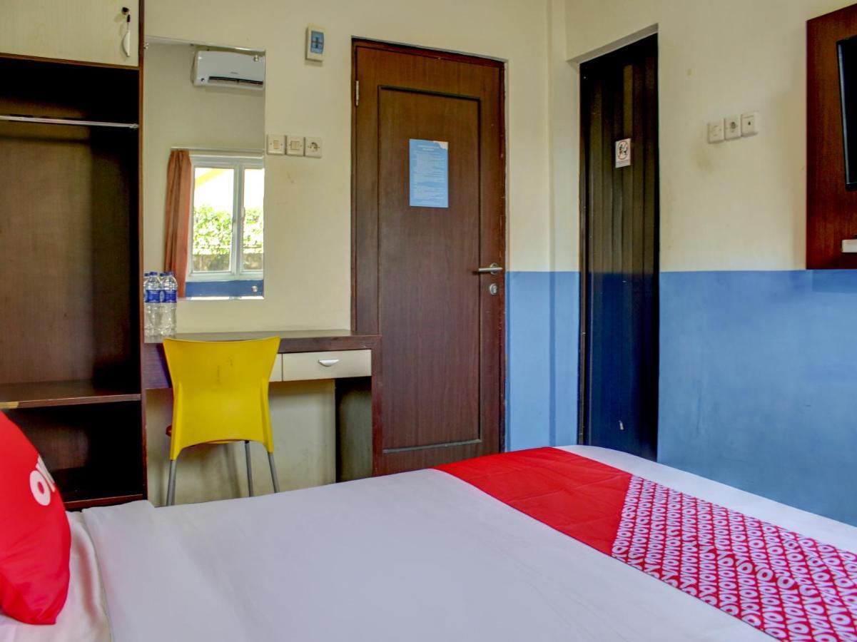 Oyo 90162 Remboelan Guest House Sungai Lutus Exterior photo