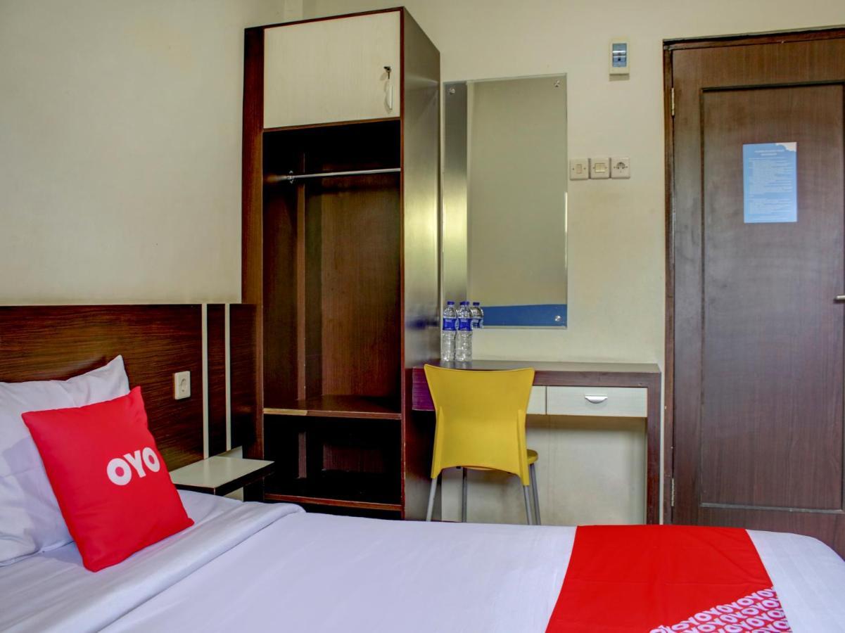 Oyo 90162 Remboelan Guest House Sungai Lutus Exterior photo