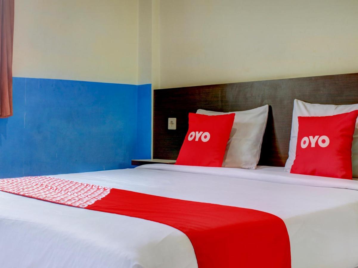 Oyo 90162 Remboelan Guest House Sungai Lutus Exterior photo