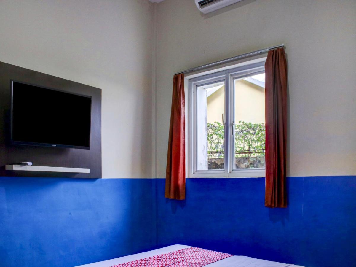 Oyo 90162 Remboelan Guest House Sungai Lutus Exterior photo