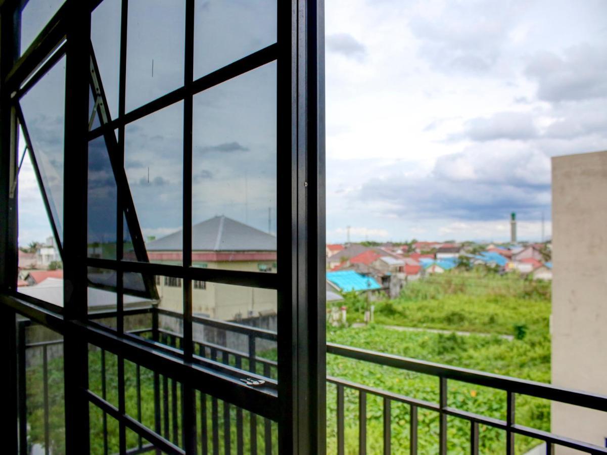 Oyo 90162 Remboelan Guest House Sungai Lutus Exterior photo